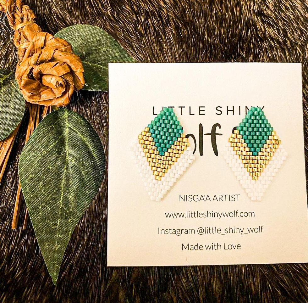 Earrings by Little Shiny Wolf.