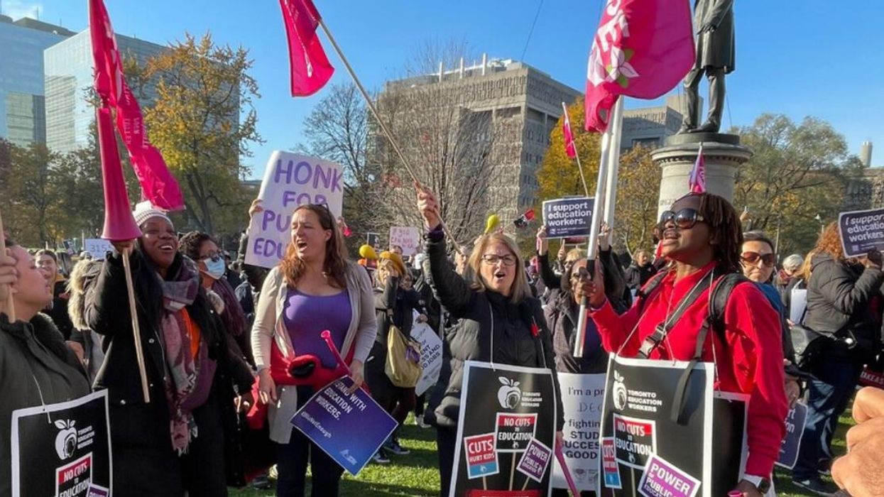 Education workers protesting outside of Queen's Park.