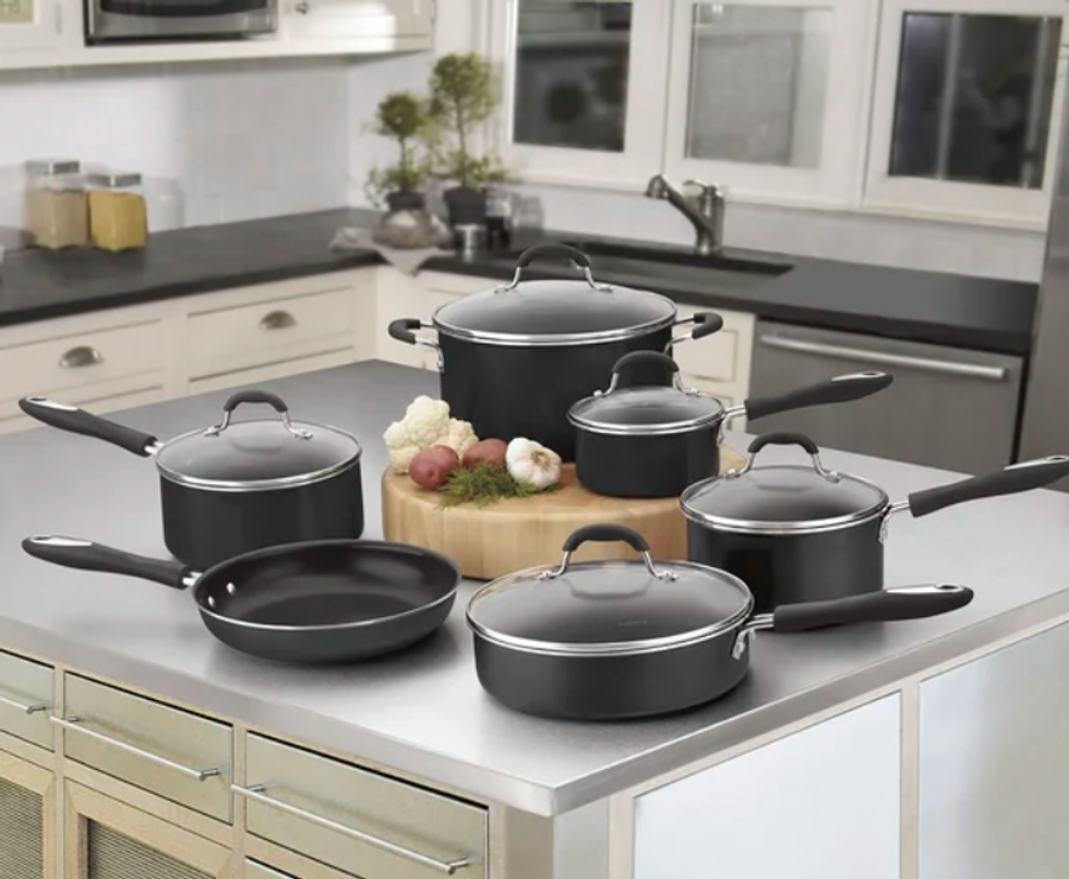 Eleven pieces of Cusinart cookware.