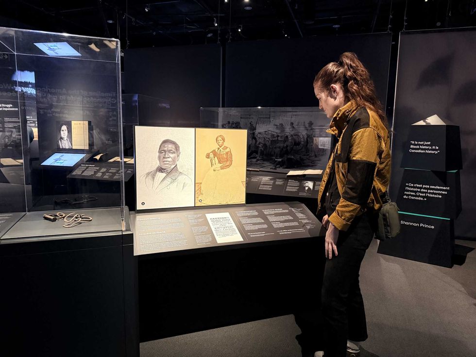 Elisha Barry in the Black history zone of the exhibition.