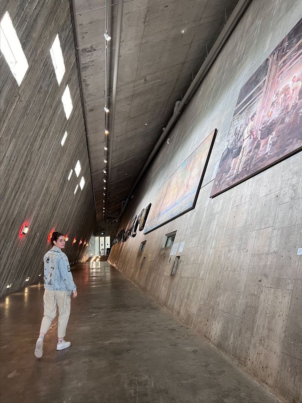 Elisha Barry in the hallway leaving the LeBreton Gallery.
