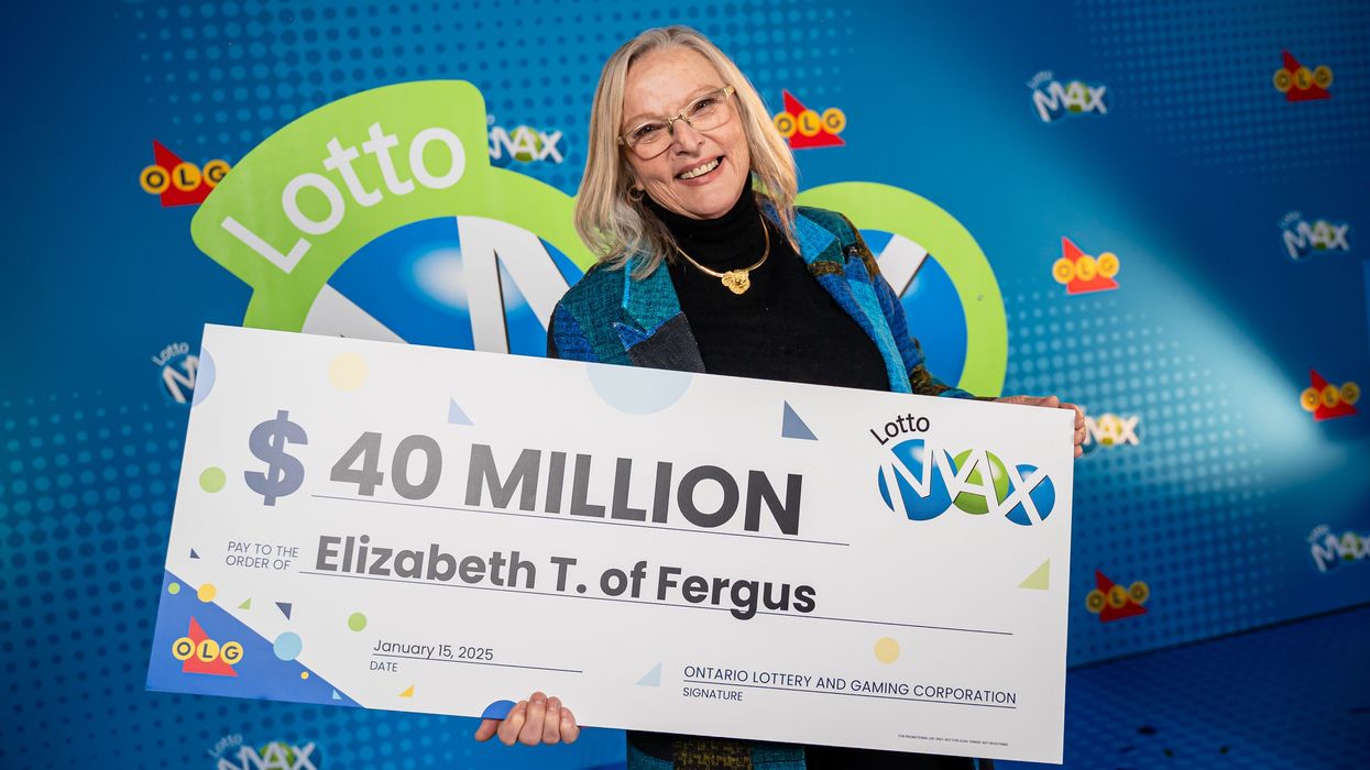 elizabeth trafford with a $40 million Lotto Max cheque