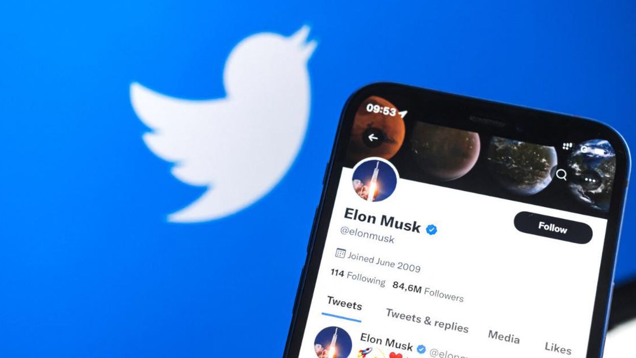 Elon Musk's Twitter account is shown.