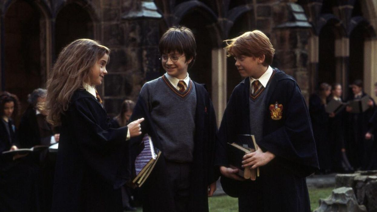 Emma Watson as Hermione Granger, Daniel Radcliffe as Harry Potter and Rupert Grint as Ron Weasley.