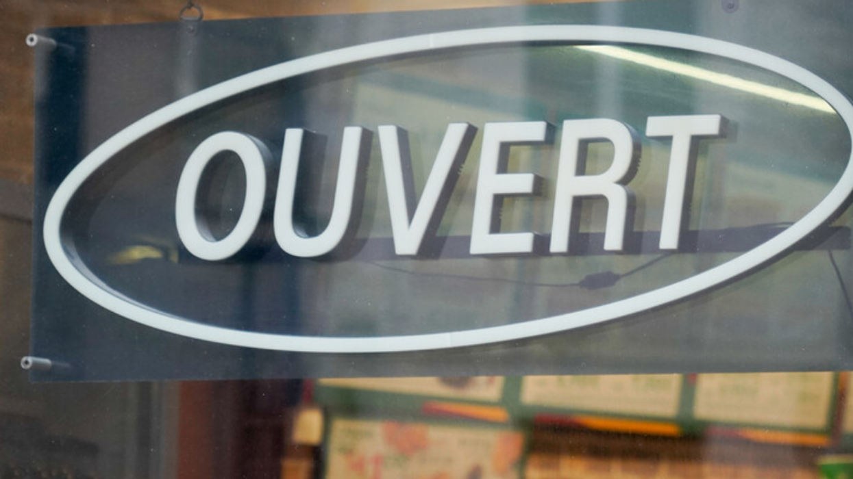 Enseigne « Ouvert ».