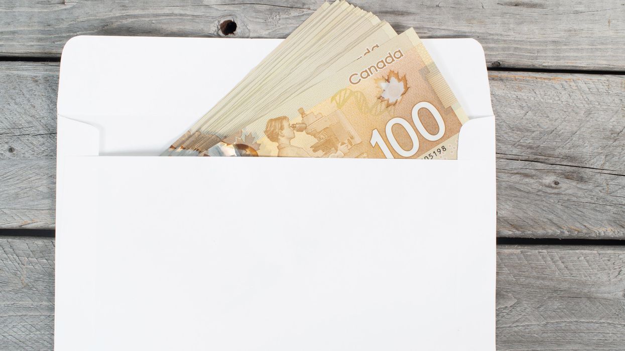 Envelope with Canadian cash (illustrative).