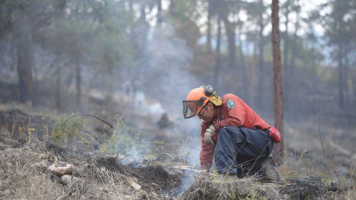 Evacuation order downgraded as B.C. wildfire held