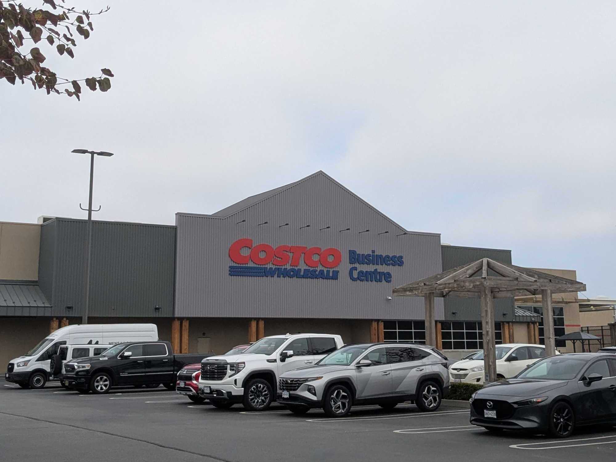 Exterior of a Costco Business Centre with parked cars in front