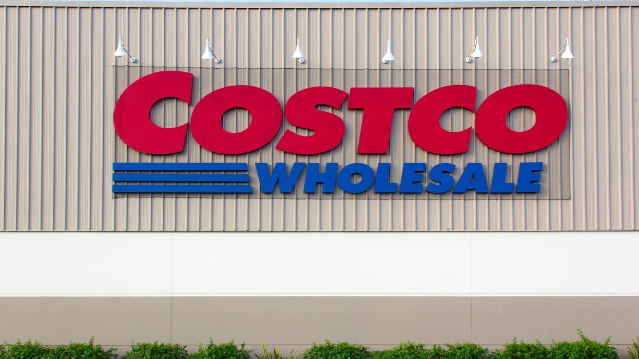 Exterior of a warehouse building with a sign reading "Costco Wholesale."