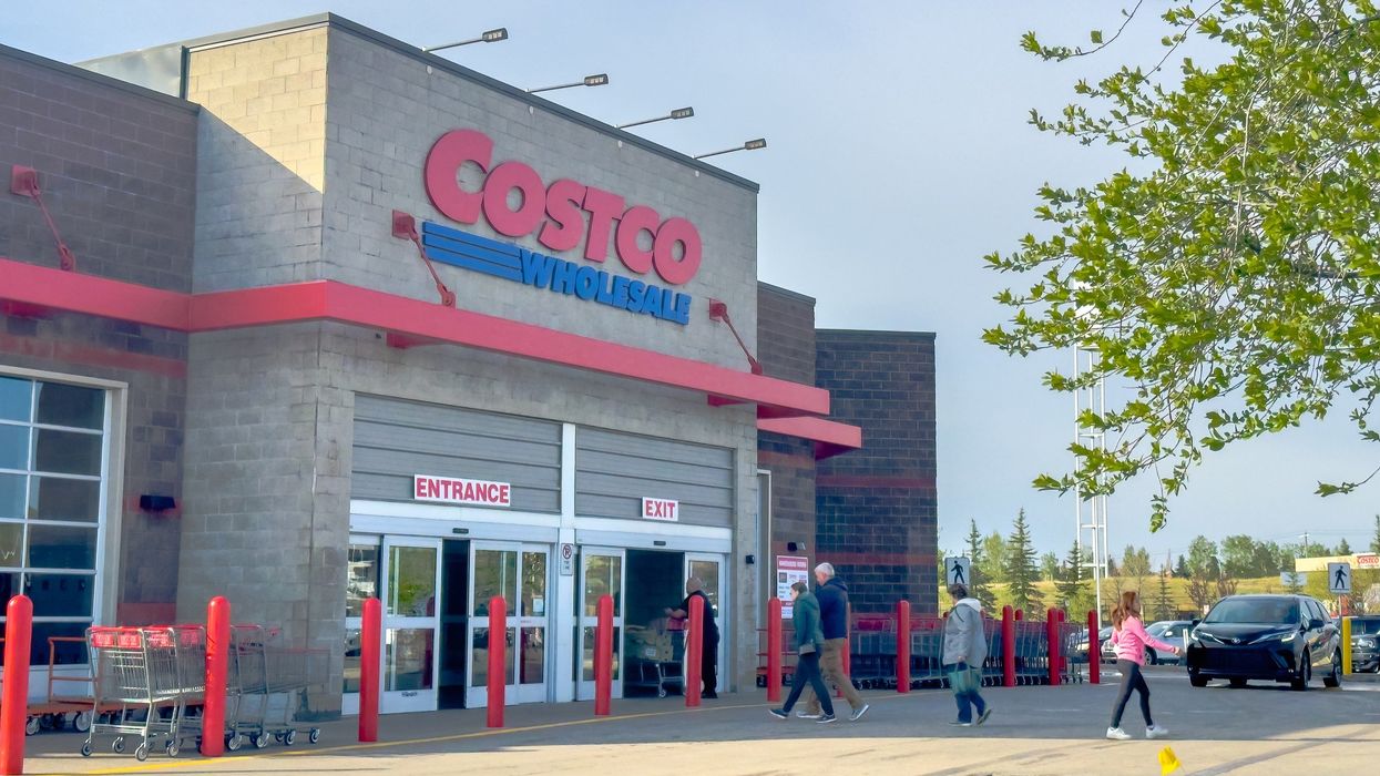exterior of costco store in canada as people walk inside