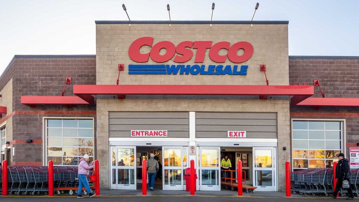 exterior of costco store in canada with people and shopping carts