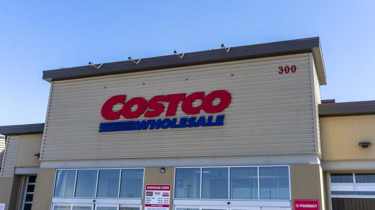 exterior of costco store in canada with red and blue costco wholesale sign