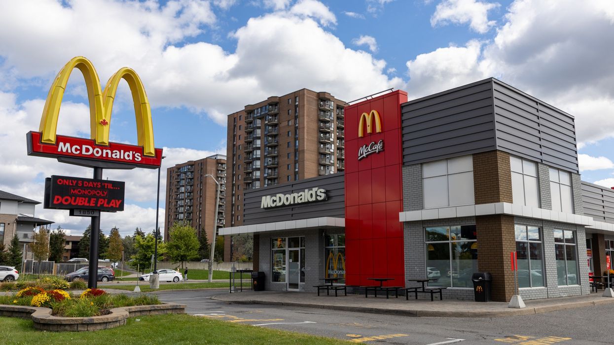 exterior of mcdonald's location in ontario with a golden arches sign