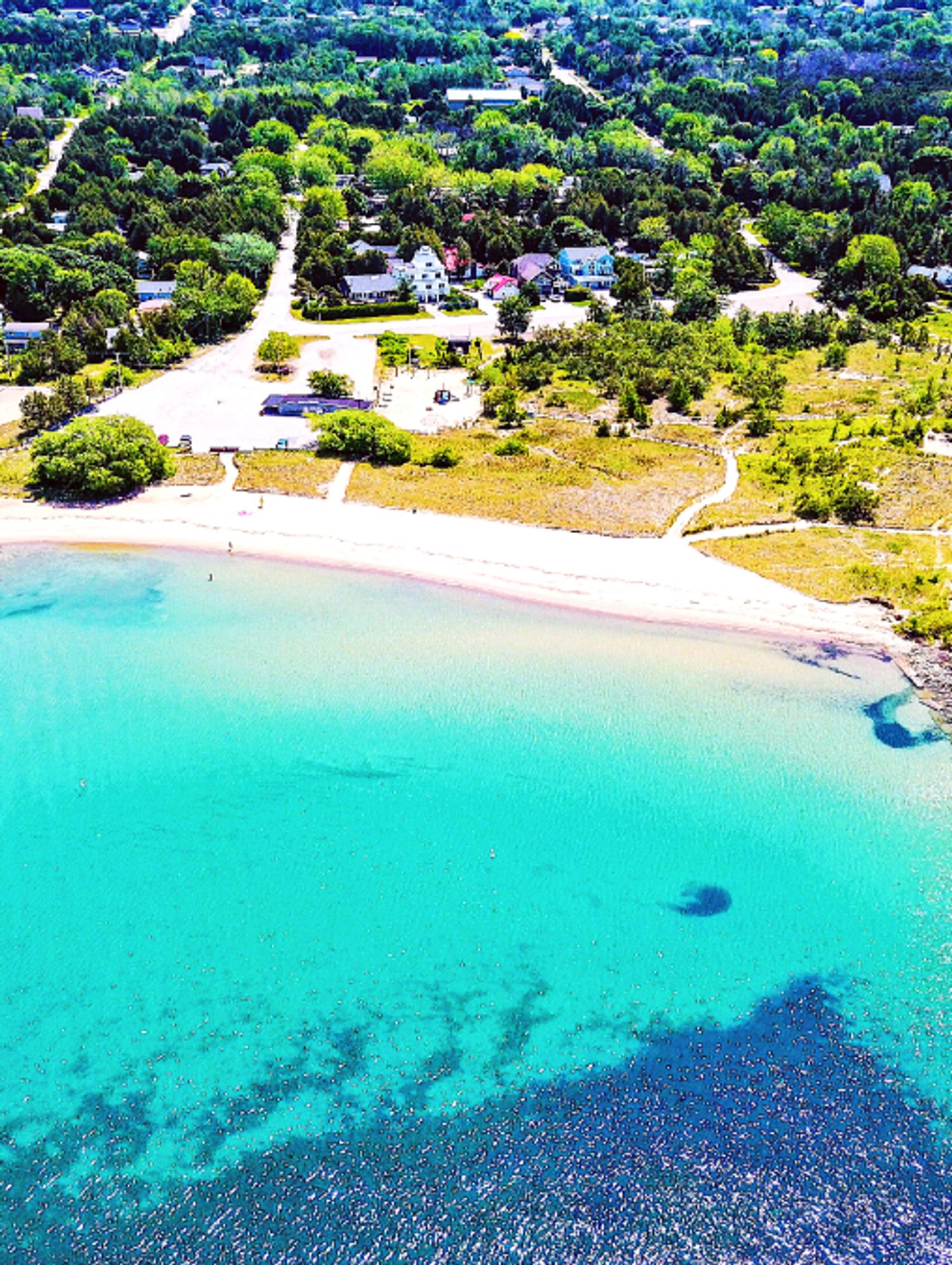 This Ontario Beach With Caribbean Blue Waters Is The Ultimate Summer