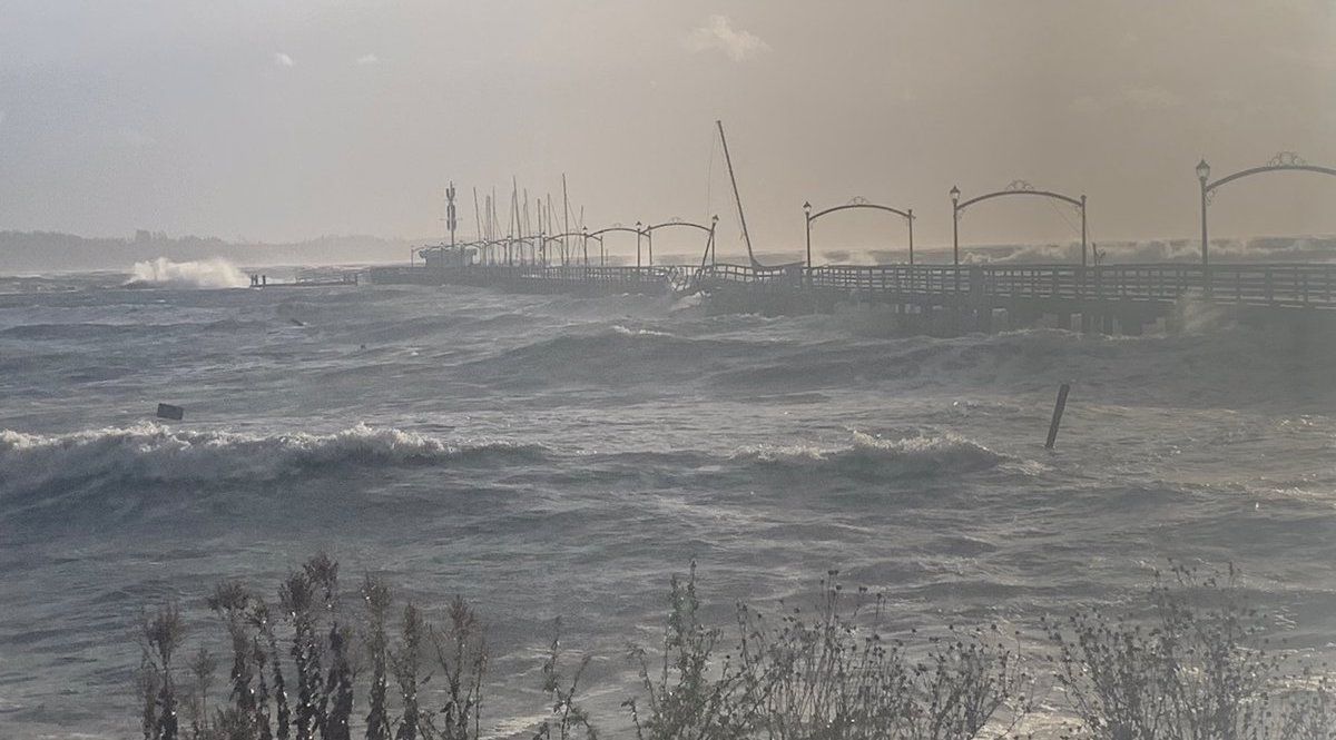 A Broken Pier, Floating Wrecked Boats And Widespread Power Outages