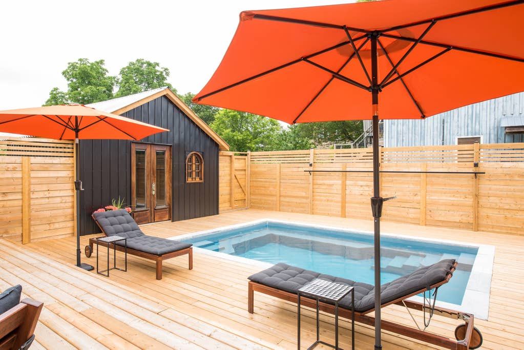 Prince Edward County Airbnb Has A Massive Outdoor Patio And Swimming