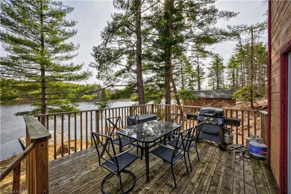 Ontario Cottage For Sale Under 700K Is Steps From A Shimmering Lake