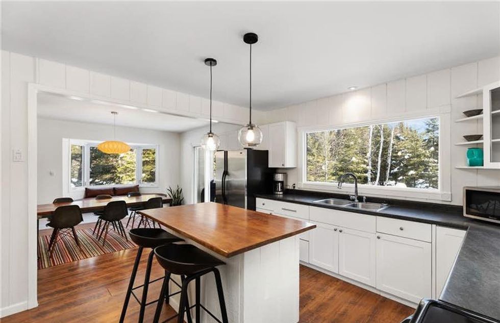 Ontario Home For Sale Is Under 600K & Has A Backyard River You Can