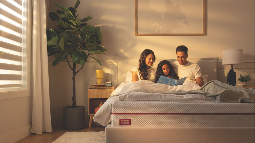 Family on Douglas bed