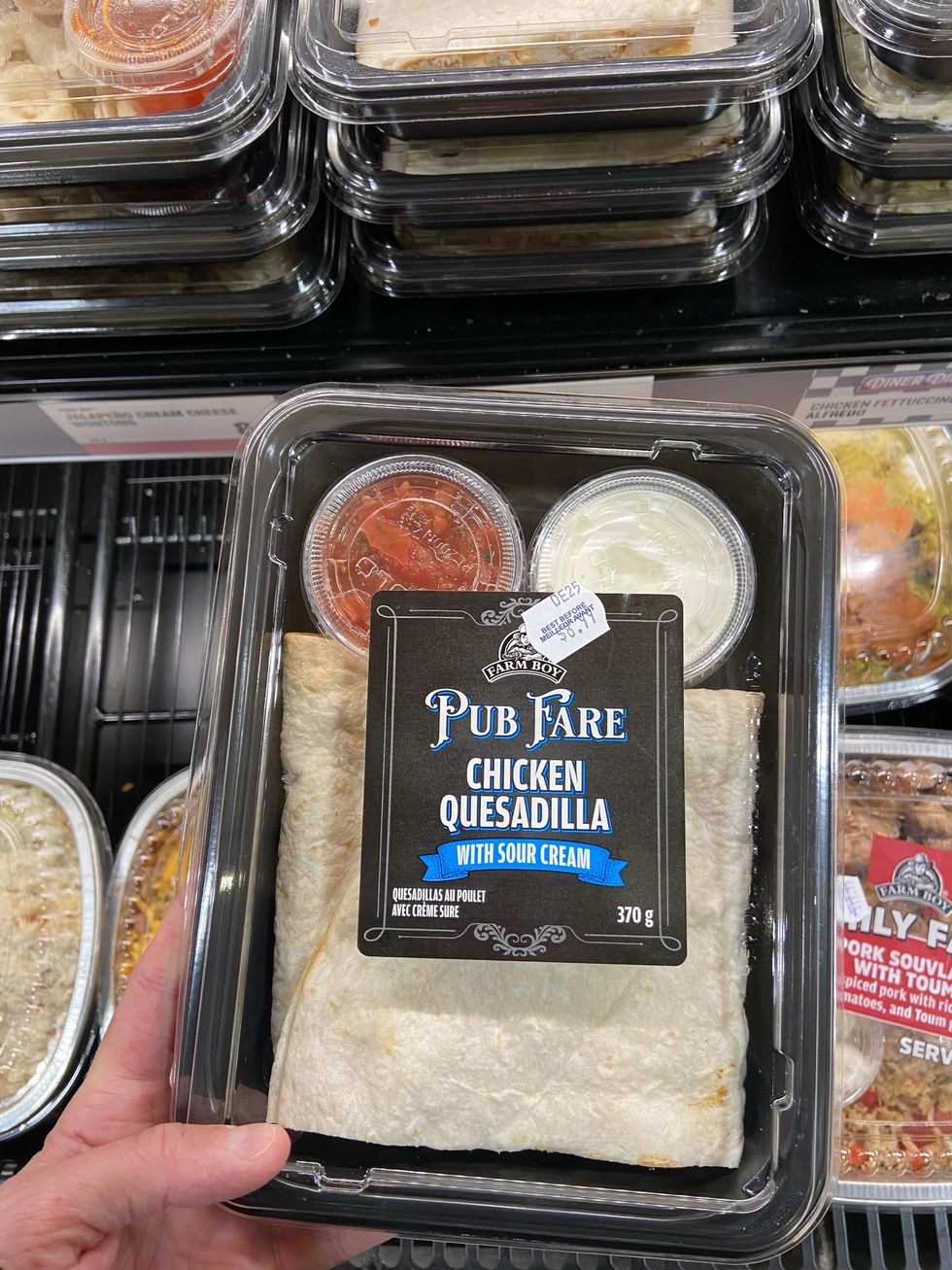 Farm Boy Chicken Quesadilla with sour cream and salsa.