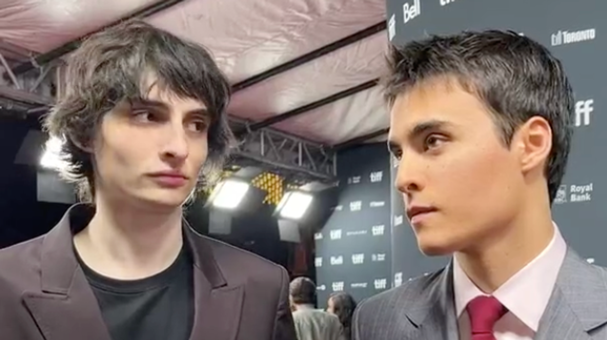 Finn Wolfhard and Billy Bryk at the TIFF red carpet for Hell of a Summer.