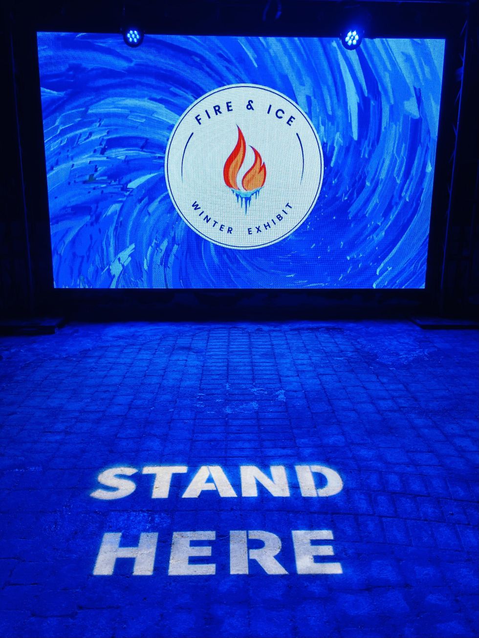 Fire and Ice Winter exhibit screen with indication to stand in front of motion sensors.