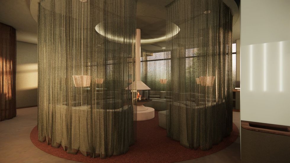 Fireplace surrounded by curtains.