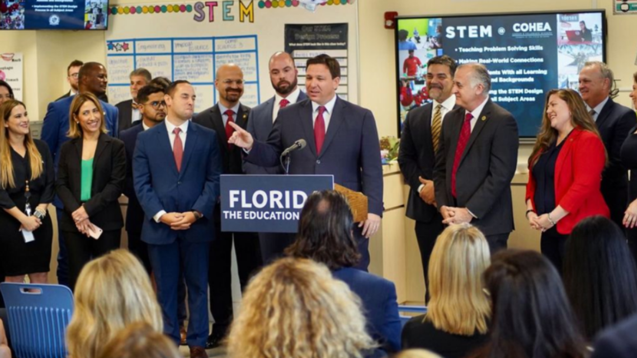 Florida Governor Ron DeSantis speaks in a classroom.