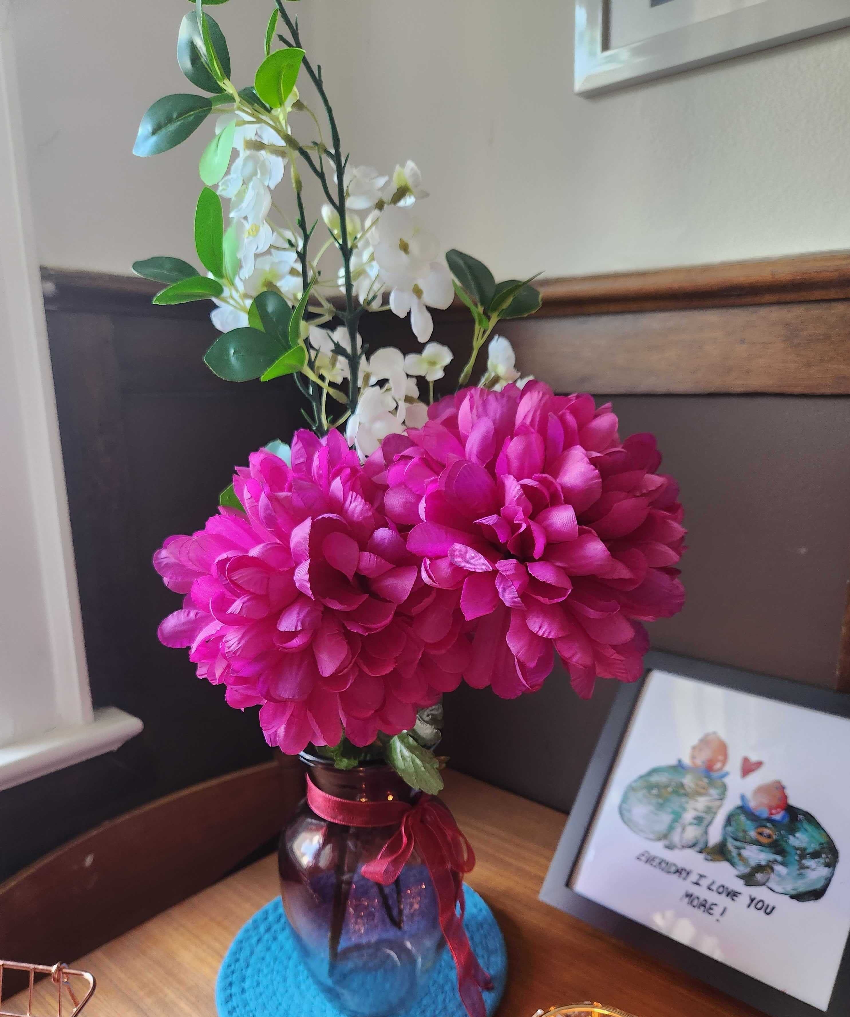 Flowers, a vase and a trivet from Dollarama.