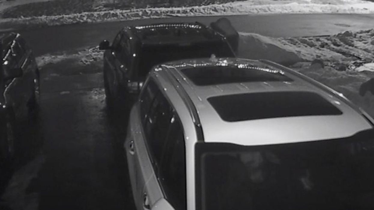 Footage of a car theft.