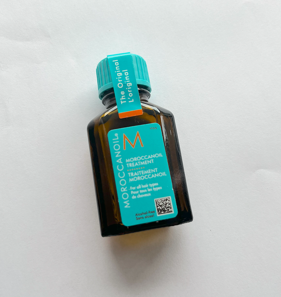 Format miniature de l'huile pour les cheveux Moroccanoil.