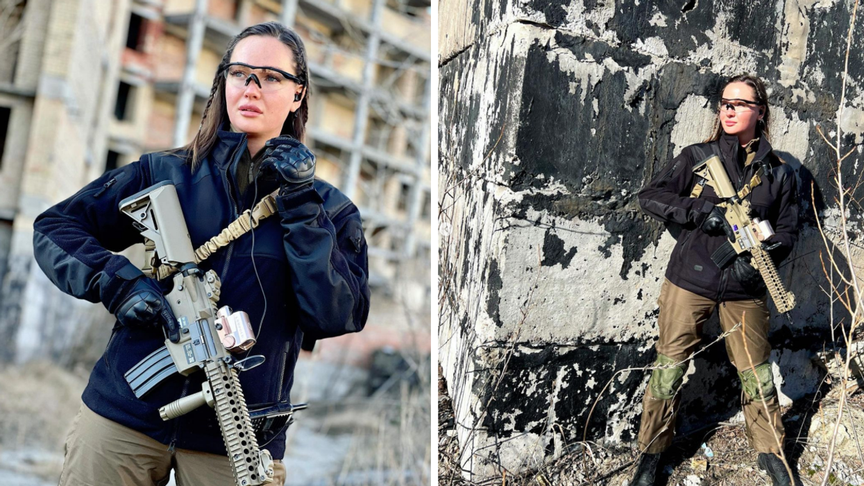 Former Miss Ukraine Anastasiia Lenna holding an Airsoft gun.