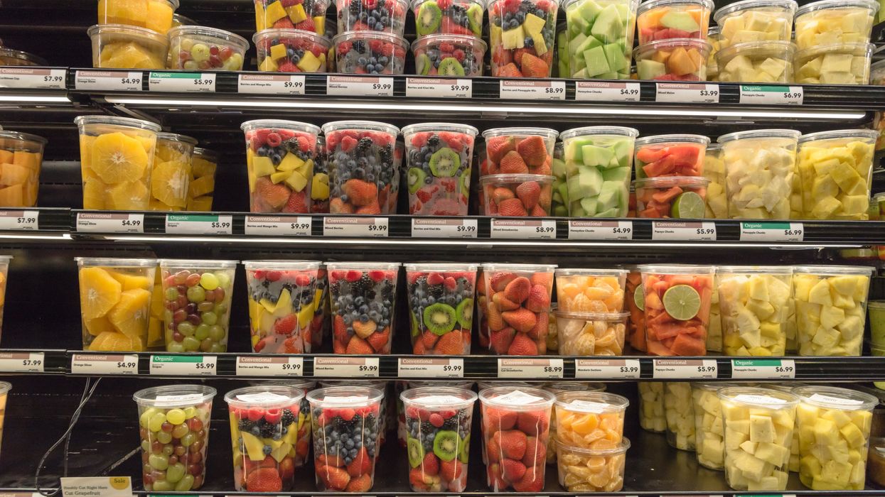 Fresh cut fruit in containers.