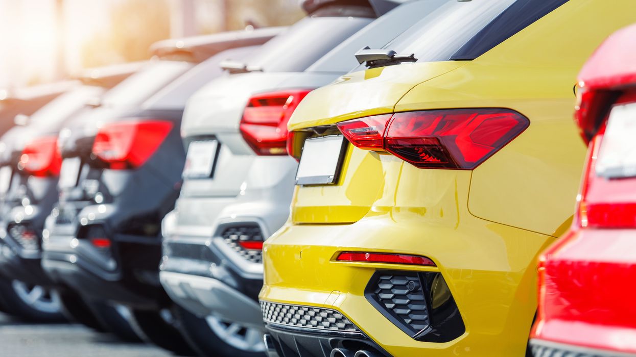 Generic vehicles lined up in a lot (illustrative).
