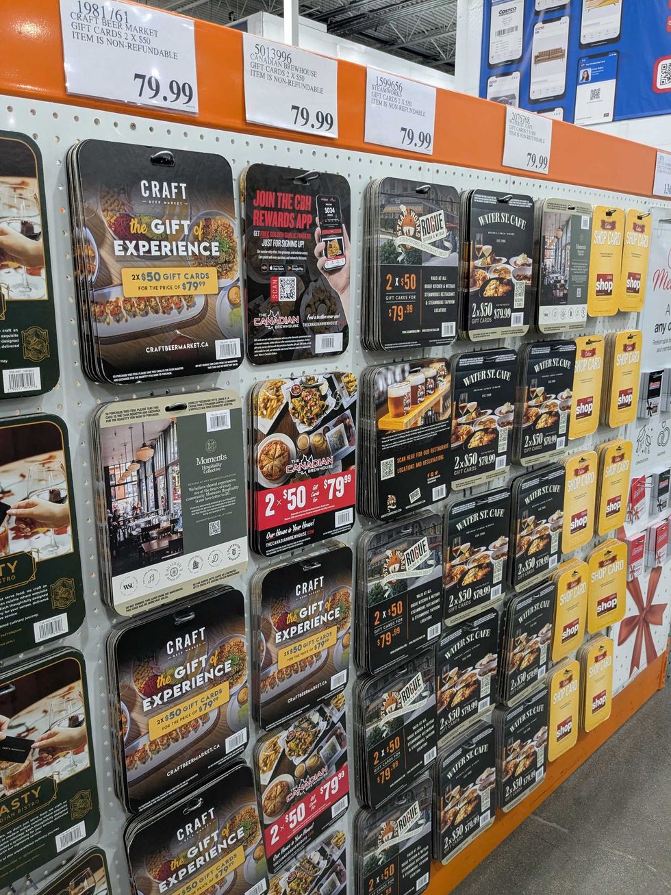 Gift cards hanging on a rack at Costco