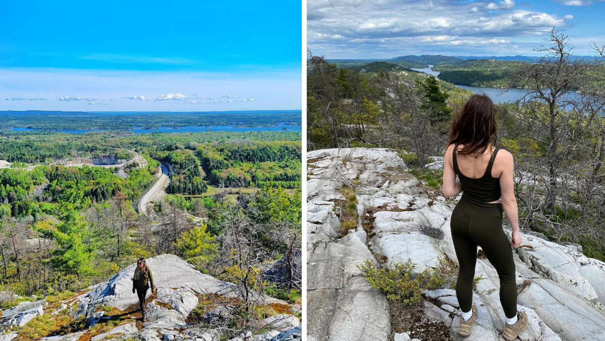 Girl standing on Willisville Mountain with a panoramic view of islands, forests and a lake.