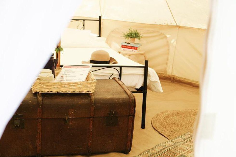 Glamping tent in Ontario with vintage decor, This Ontario Campground Motel Is Off The Grid & Has Serious Woodstock Vibes