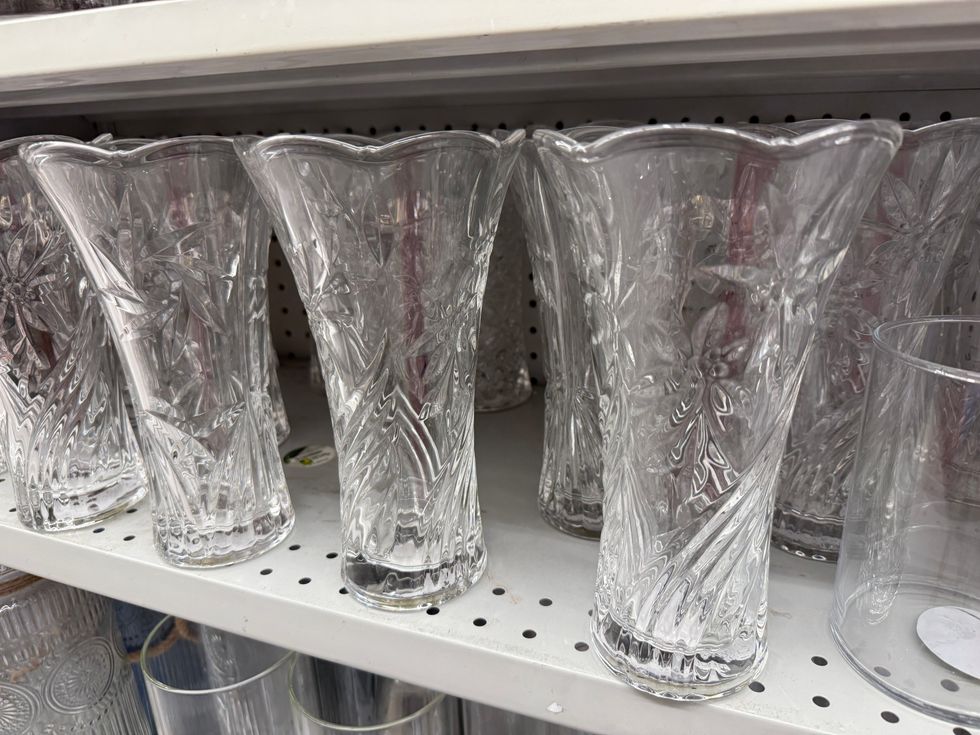 Glass vases on a store shelf.