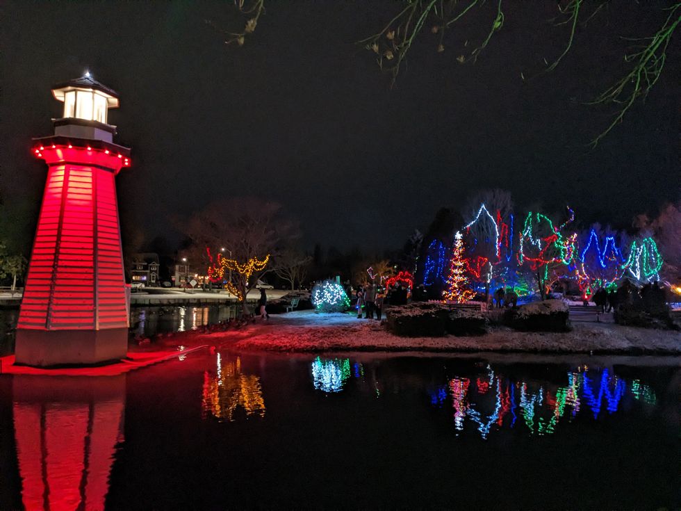 Glowing lighthouse and Christmas lights.