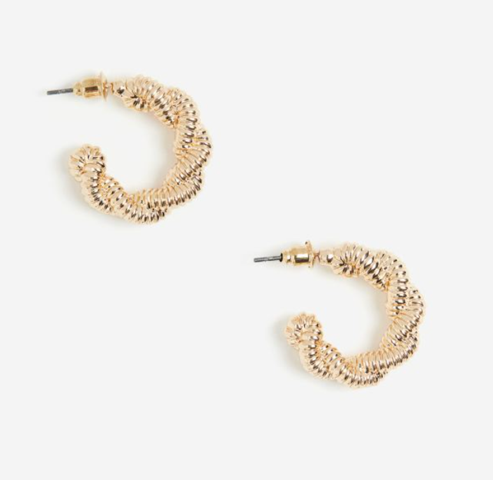 Gold braided hoop earrings.