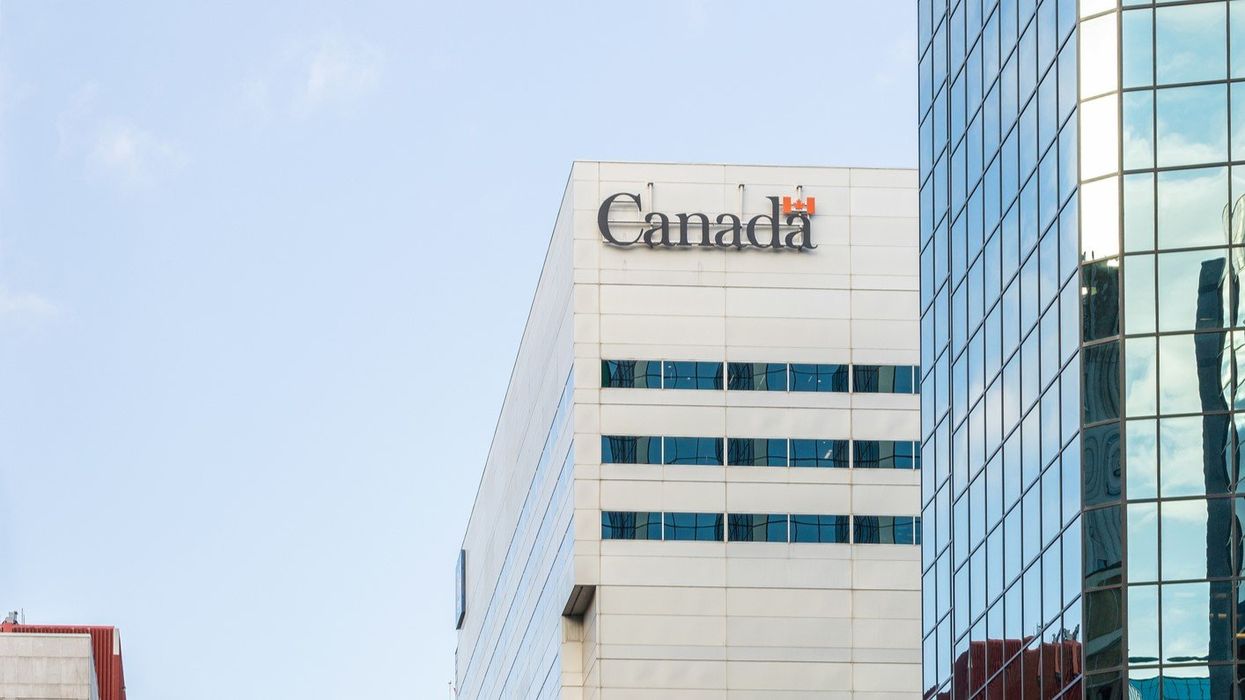 Government of Canada building in Ottawa with the official Canada logo.