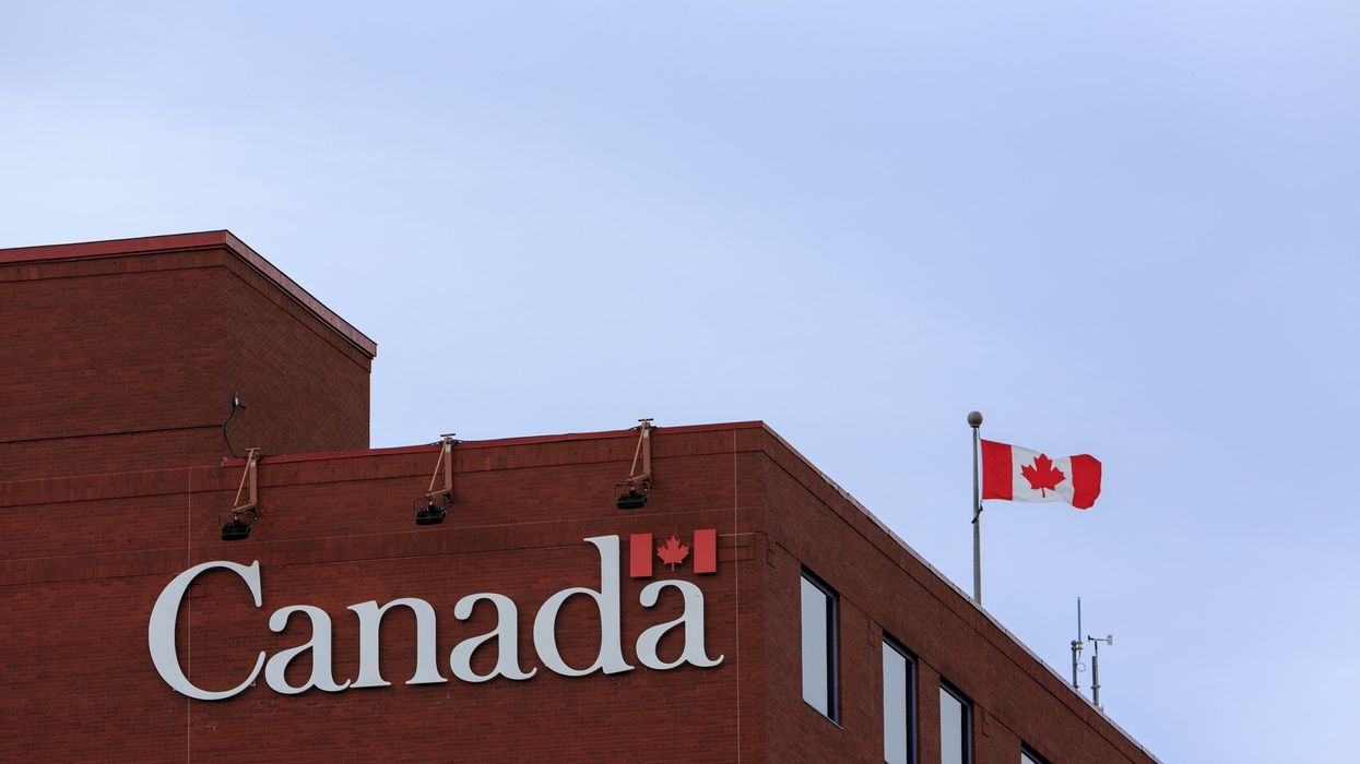 Government of Canada building with a Canadian flag.