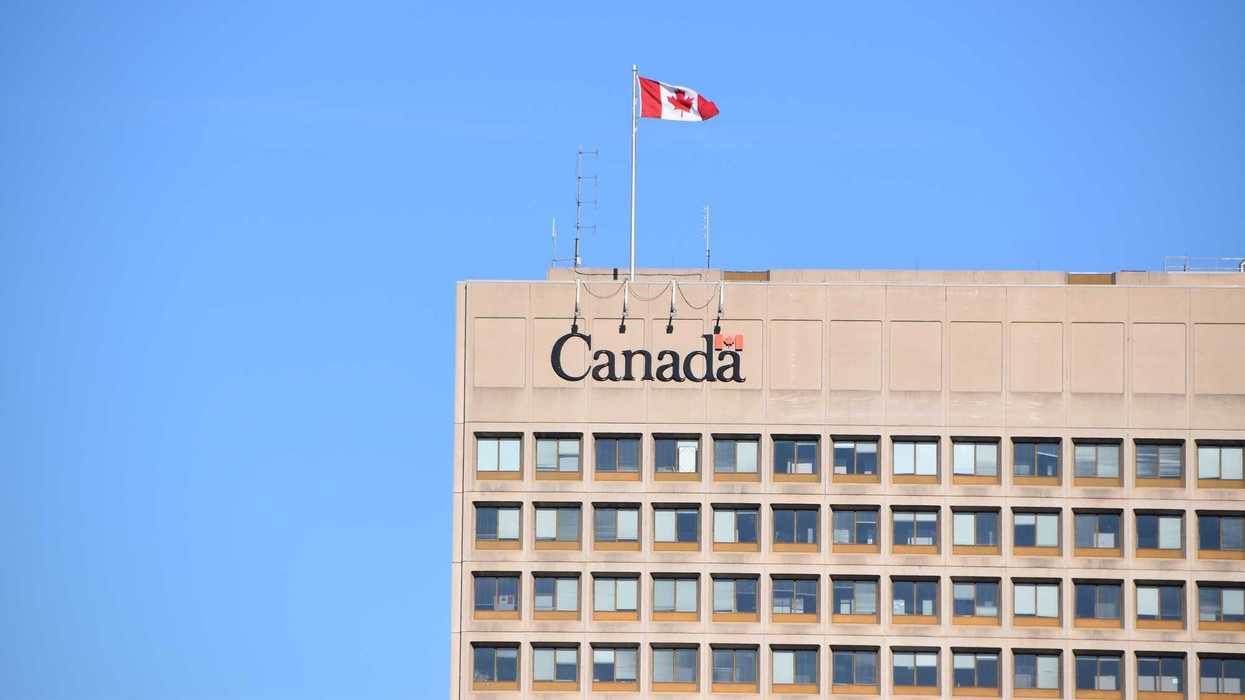government of canada building with canada logo and canadian flag