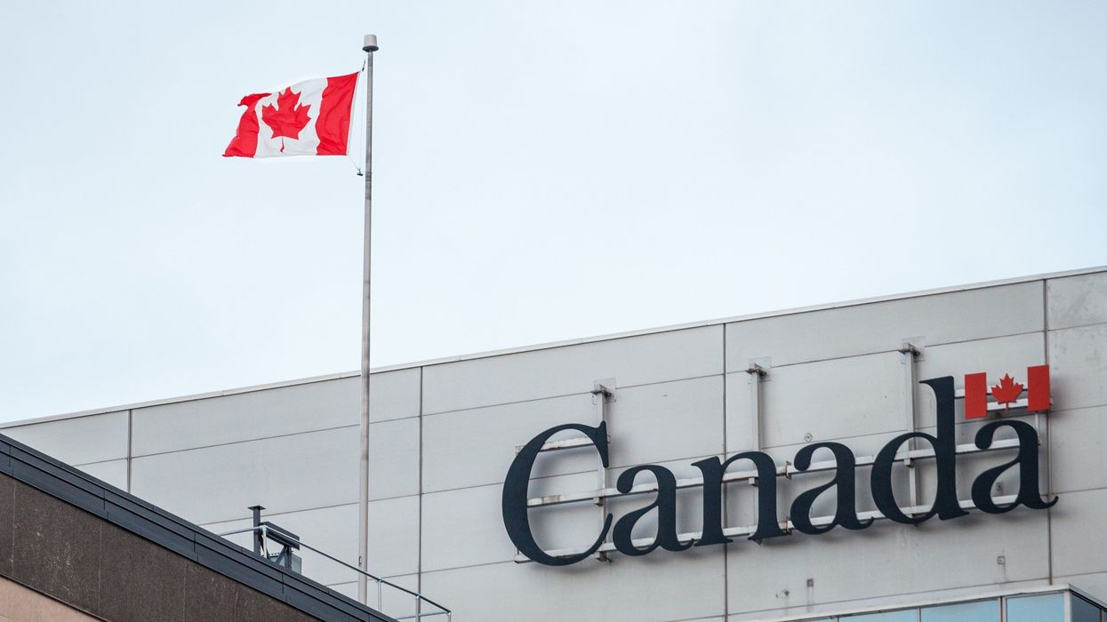 government of canada building with flag