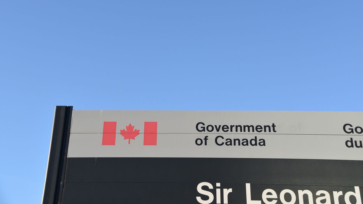 government of canada sign at a federal building in ottawa