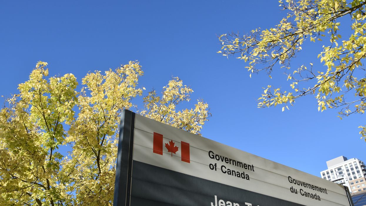 government of canada sign outside of a building in ottawa