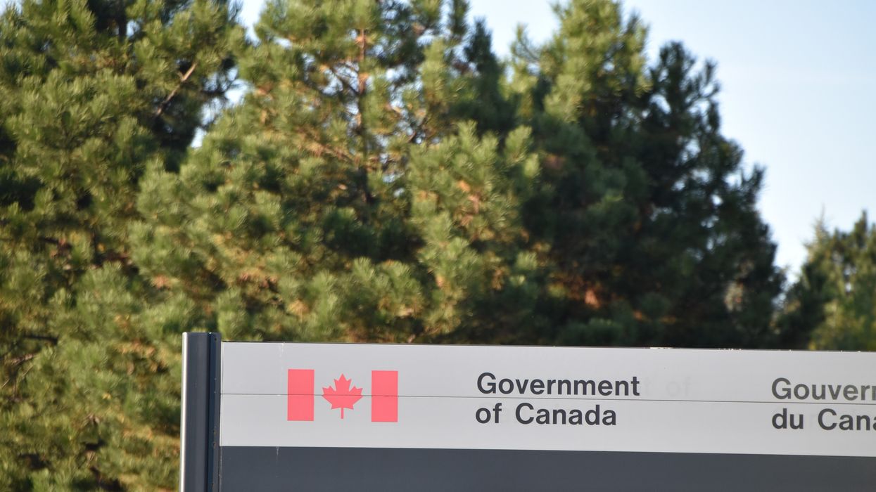 government of canada sign with a canadian flag logo