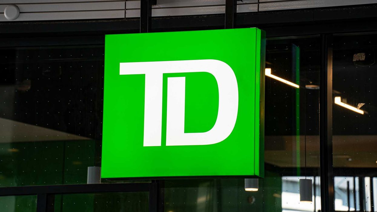 green and white td sign on a building