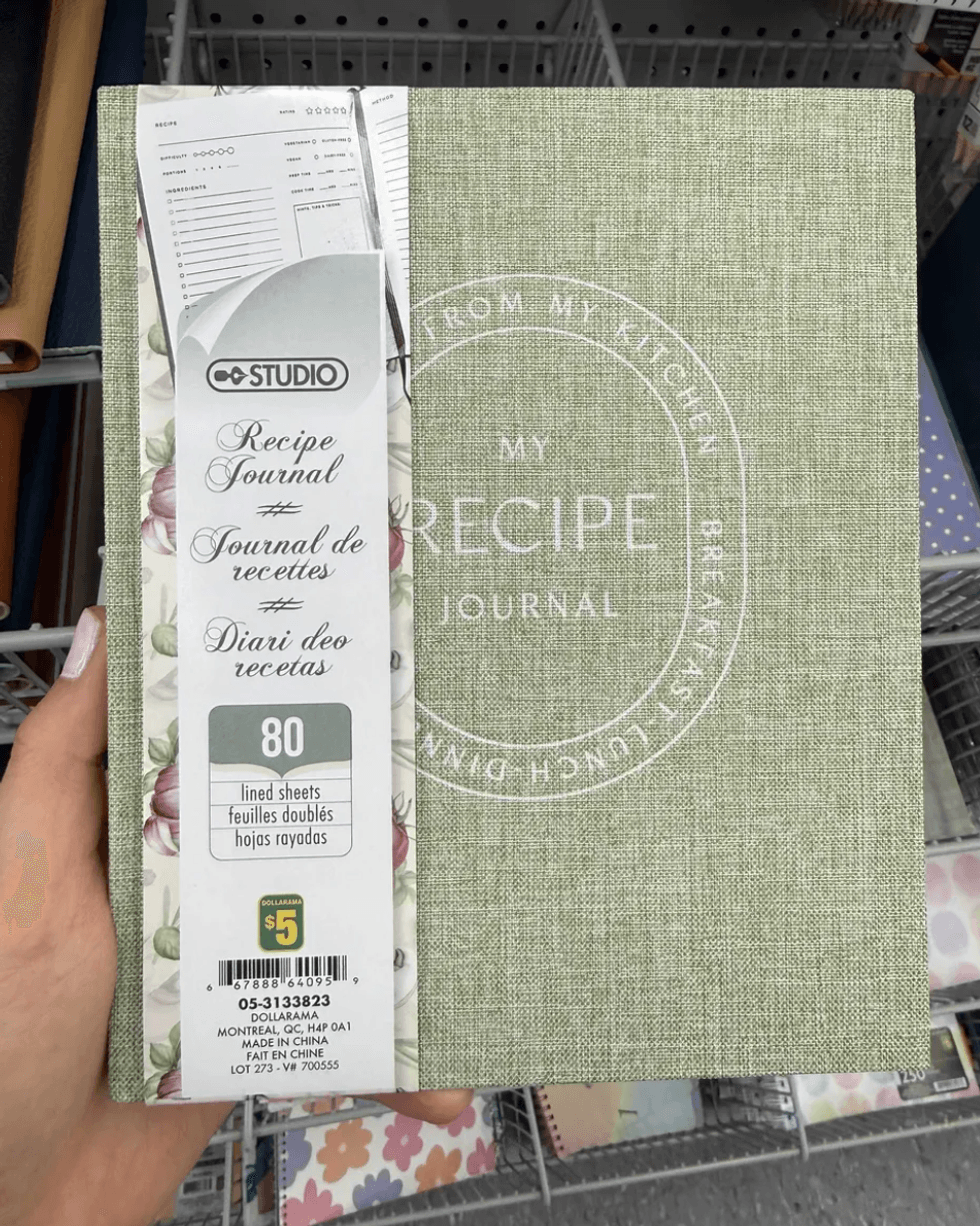 Green textured recipe journal priced at $5, featuring 80 lined sheets.