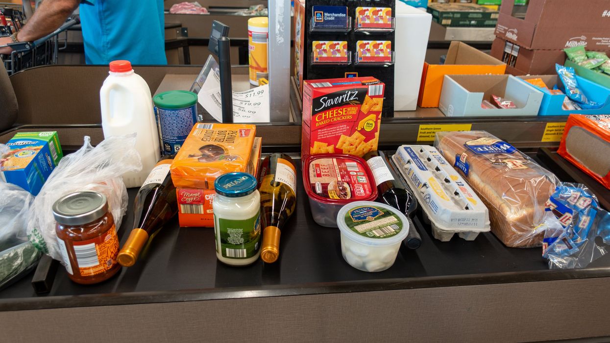 Groceries on a conveyor belt.